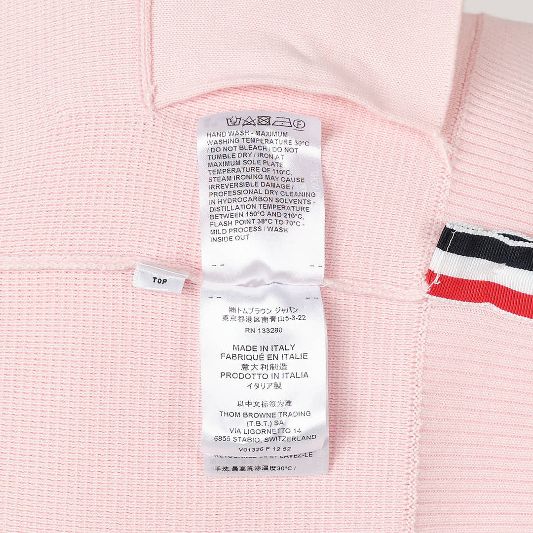 Thom Browne sky blue Milano stitch cardigan with four white bar stripes on the sleeve, V-neck, button front, and patch pockets