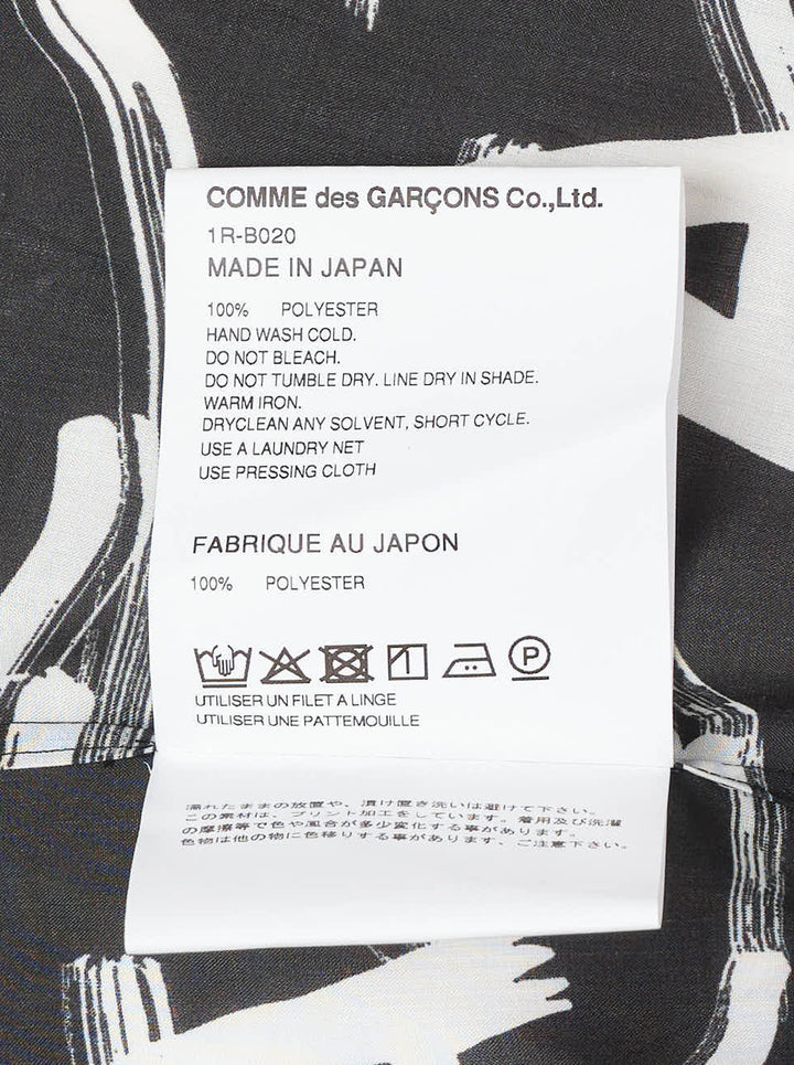 Comme des Garçons BLACK Filip Pagowski long sleeve oversized shirt in black polyester lawn with all-over white brushstroke and fragmented letter print - view 3