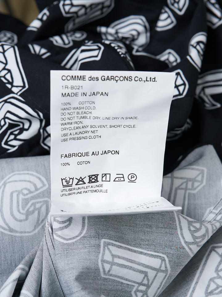 Comme des Garçons BLACK Filip Pagowski long sleeve black cotton shirt with all-over 3D white typographic letterform print and zip detailing on the front panels - view 3
