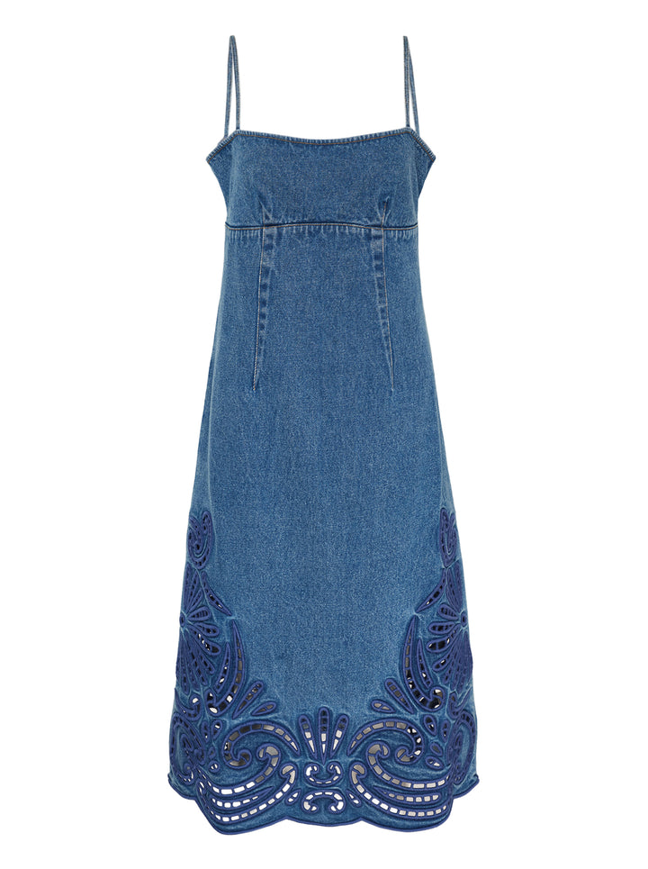 Ulla Johnson Jane Eyelet Denim Dress in washed blue denim with spaghetti straps, empire waist and indigo cutwork embroidery along the scalloped hem