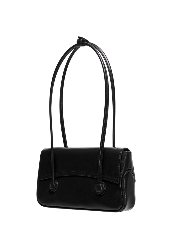 Marge Sherwood Flap Small shoulder bag in black high-shine leather with a looped top handle, front flap closure, twin side pockets, ring hardware, and contrast topstitching on a white background - view 2