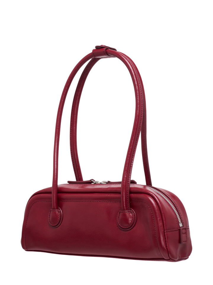 Marge Sherwood Soft Boston EW Mini shoulder bag in deep burgundy crinkle-glazed leather with arched double top handles and embossed logo, front view on white background - view 2