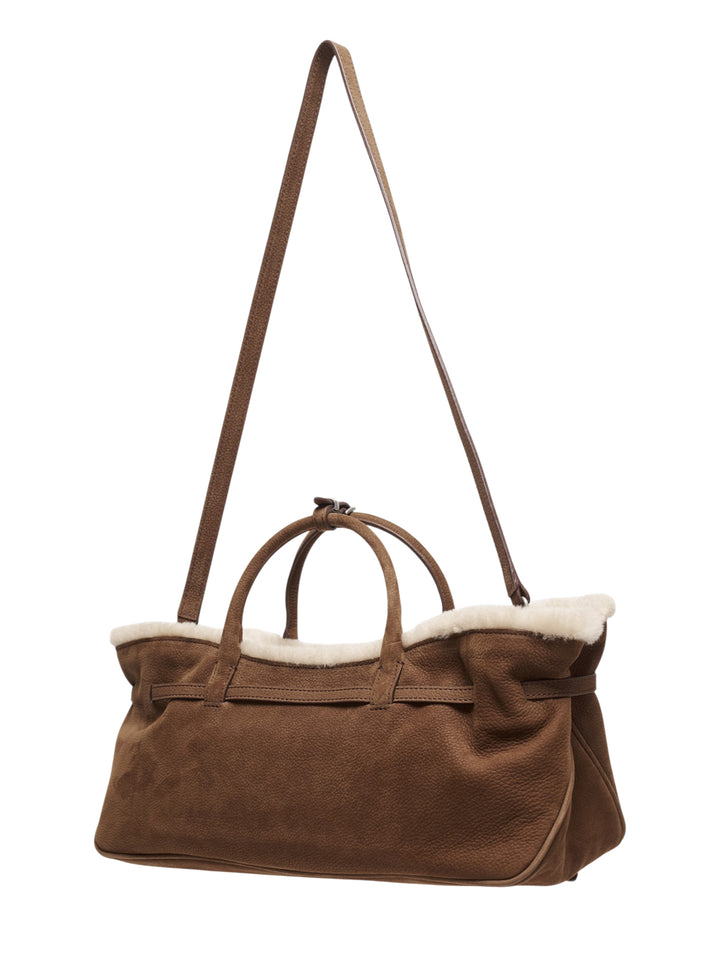 Marge Sherwood Grandma tote bag in tan pebbled leather with cream shearling trim, dual top handles, long adjustable strap, and double-buckle belt detail on the front - view 2