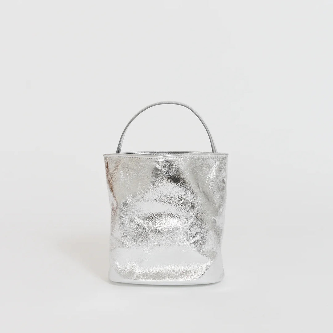Marge Sherwood Wired Bucket Bag in crinkled metallic silver leather with a slim top handle and gold-tone charm on chain - view 3
