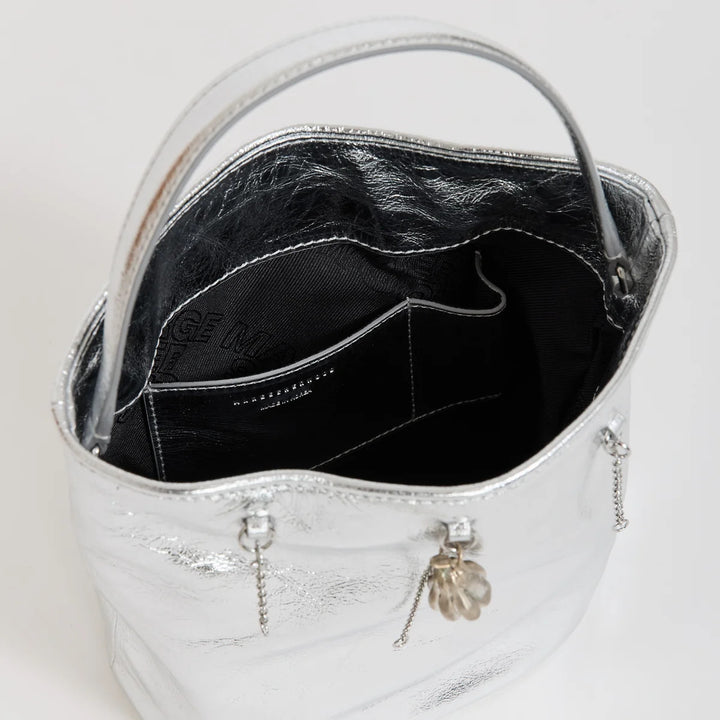 Marge Sherwood Wired Bucket Bag in crinkled metallic silver leather with a slim top handle and gold-tone charm on chain - view 4