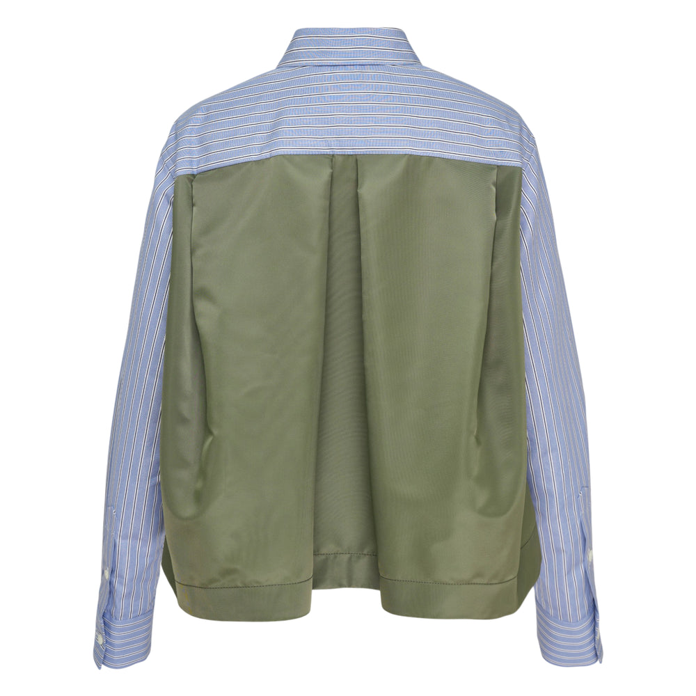 sacai Cotton Poplin x Nylon Twill Shirt in blue and white stripe with contrast olive nylon back panel, long sleeves, point collar, and chest pocket — front view