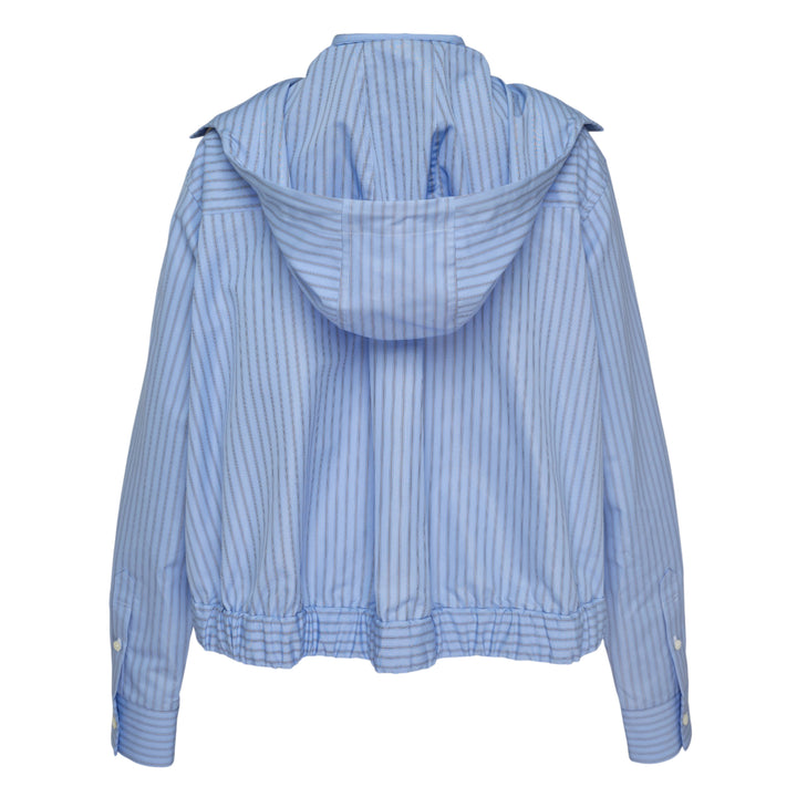 sacai black poplin zip-up jacket with layered sleeve detailing, silver zipper, spread collar with snap tabs, and ribbed hem, front view on white background
