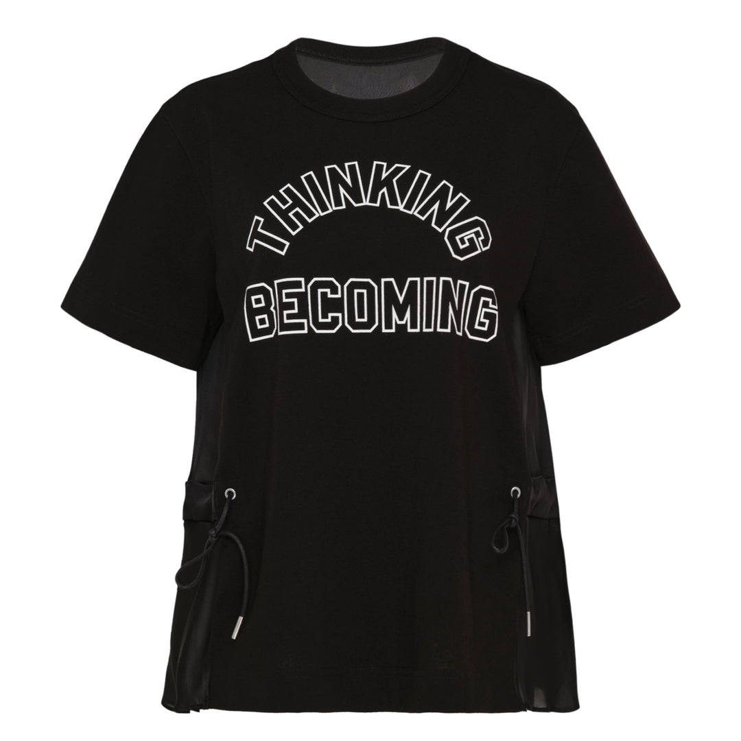 sacai Thinking Becoming Graphic Tee in black with arched collegiate print and sheer drawstring side panels
