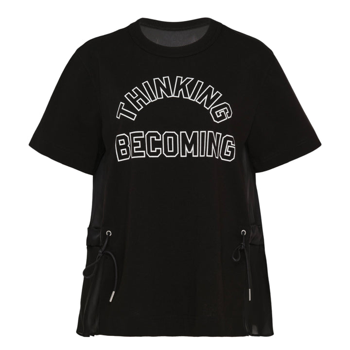 sacai Thinking Becoming Graphic Tee in black with arched collegiate print and sheer drawstring side panels