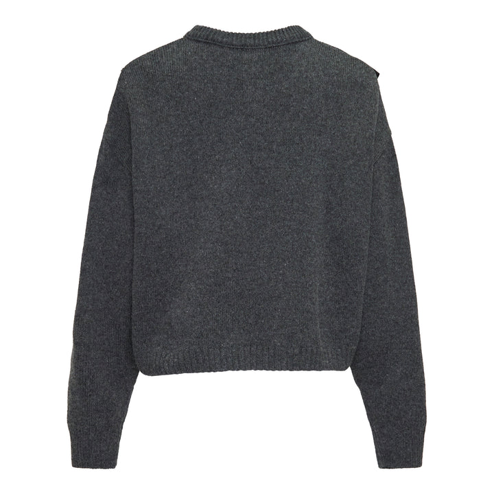 Y's Appliqué Short Cardigan in grey marl wool-blend, featuring cascading black mixed-fabric appliqué panels in organza and boucle across the front, with button fastening and ribbed cuffs, back view on white background