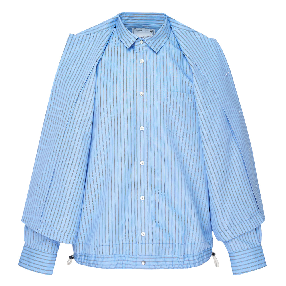 sacai Poplin Long Sleeve Shirt in black, featuring a double-layered button-front placket, dual chest patch pockets, spread collar, and elasticated ribbed hem, shot flat on a white background