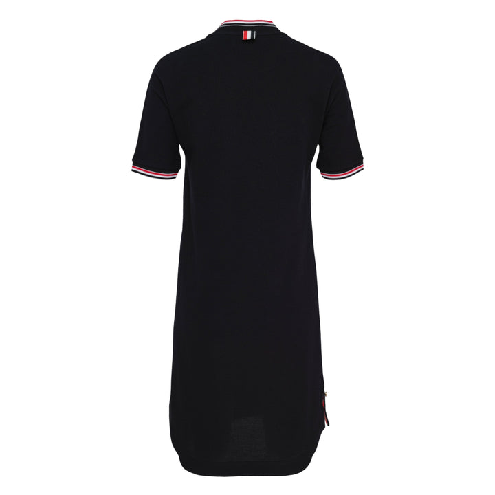 Thom Browne navy cotton T-shirt dress with red, white, and blue striped tipping at the crew neck and sleeve cuffs, gold-toned button hardware at the hem, and woven brand label at the front