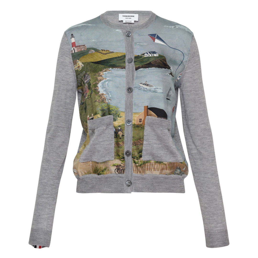 Thom Browne Nantucket Scenic Cardigan in grey jersey stitch with a detailed painted coastal landscape panel across the front, button fastening, two patch pockets, and signature red, white, and blue cuff tab