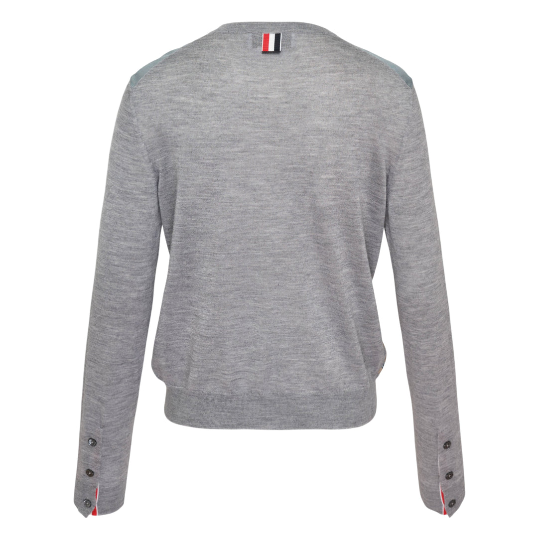 Thom Browne Nantucket Scenic Cardigan in grey jersey stitch with a detailed painted coastal landscape panel across the front, button fastening, two patch pockets, and signature red, white, and blue cuff tab