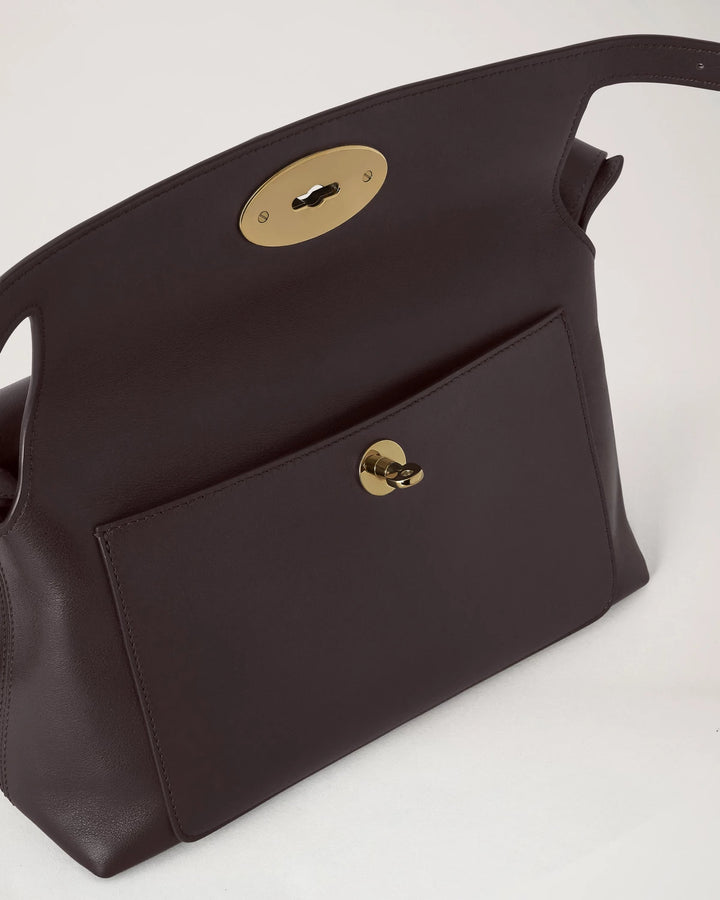 Small Stevie Top Handle Ebony Supple Smooth Leather