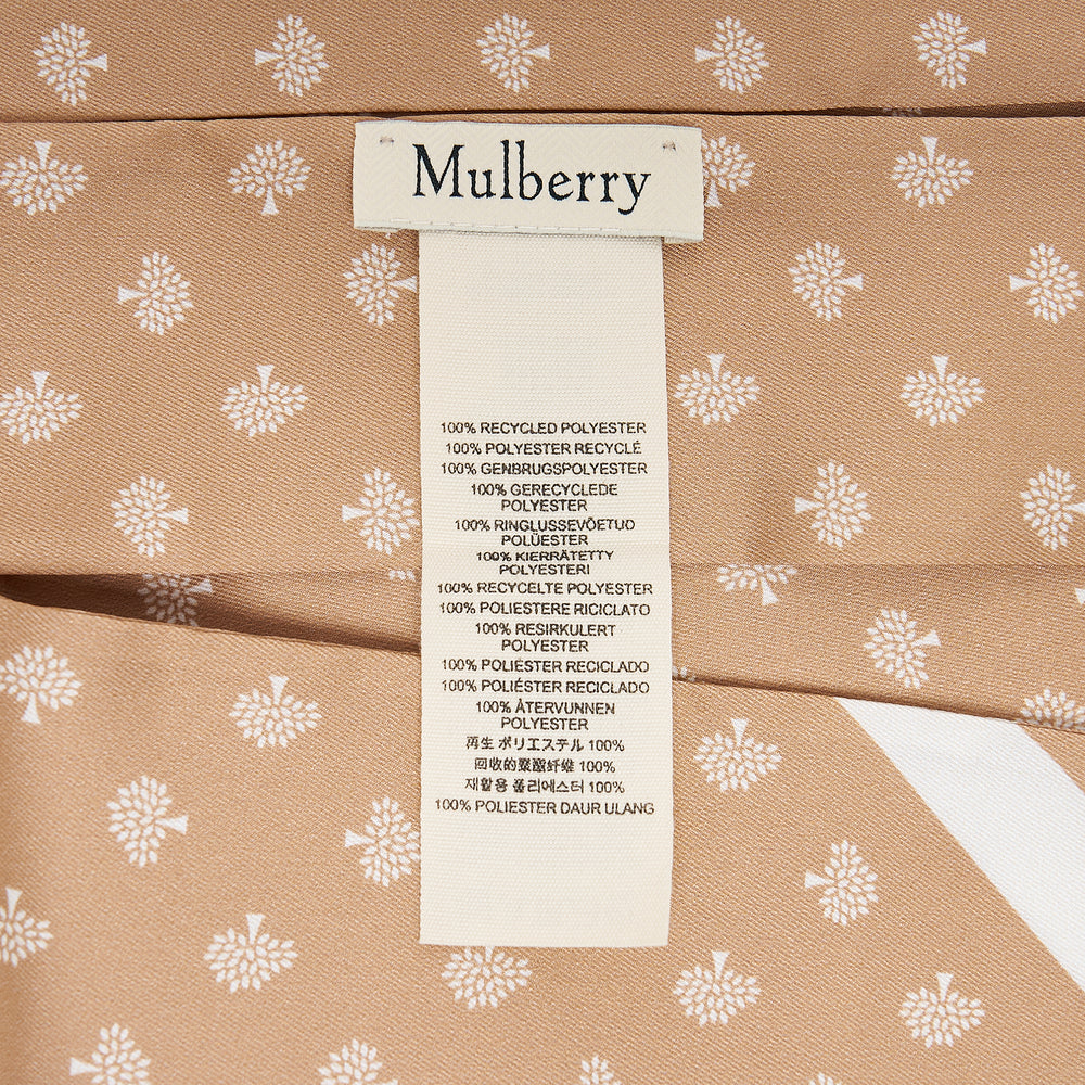 Mulberry Tree Skinny Scarf in camel with all-over white mulberry tree print, white border trim, and Mulberry logo at pointed ends