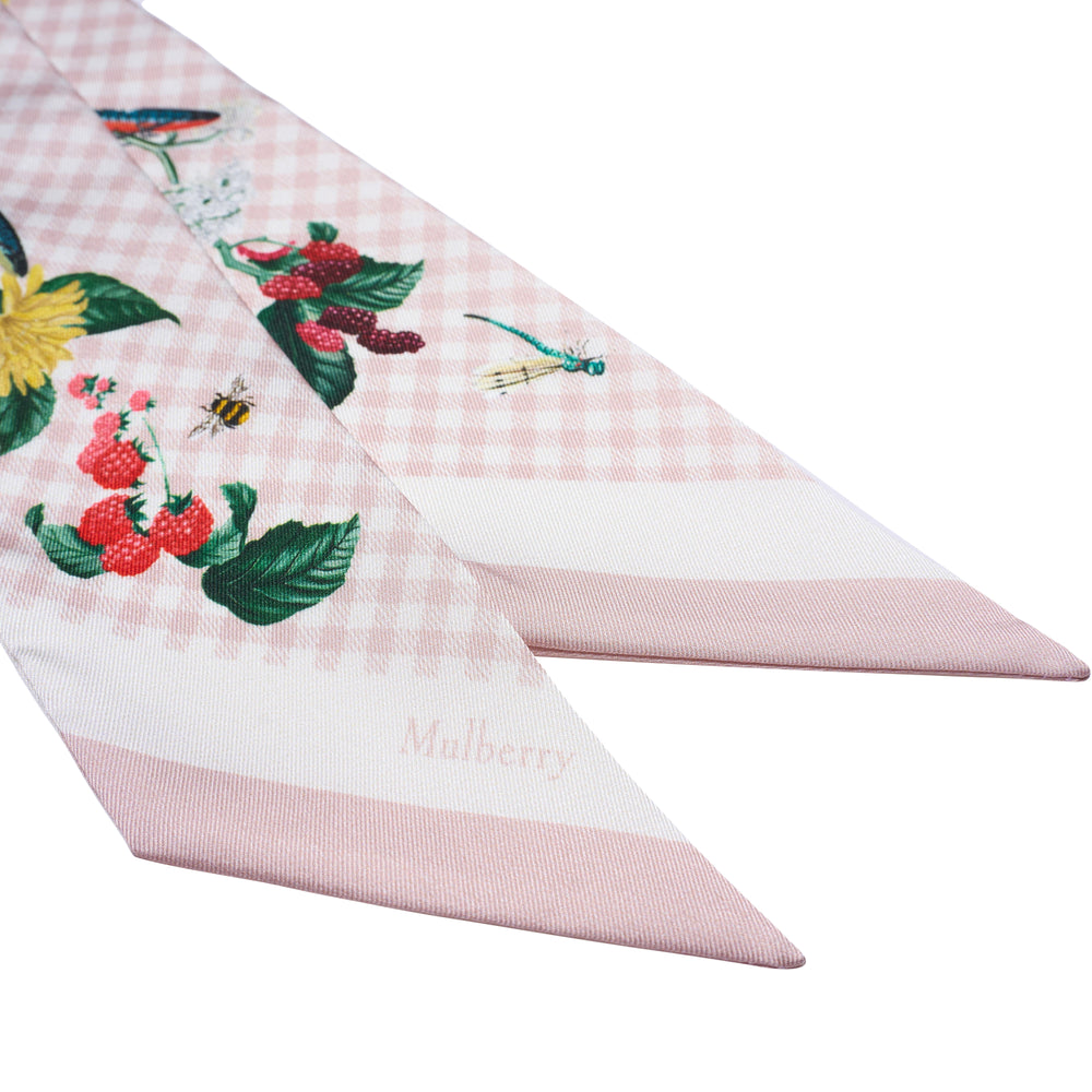 Mulberry Riverside Floral Skinny Scarf in blush pink gingham with botanical berry, wildflower, and insect illustrations, shown laid flat in a V-shape against a white background