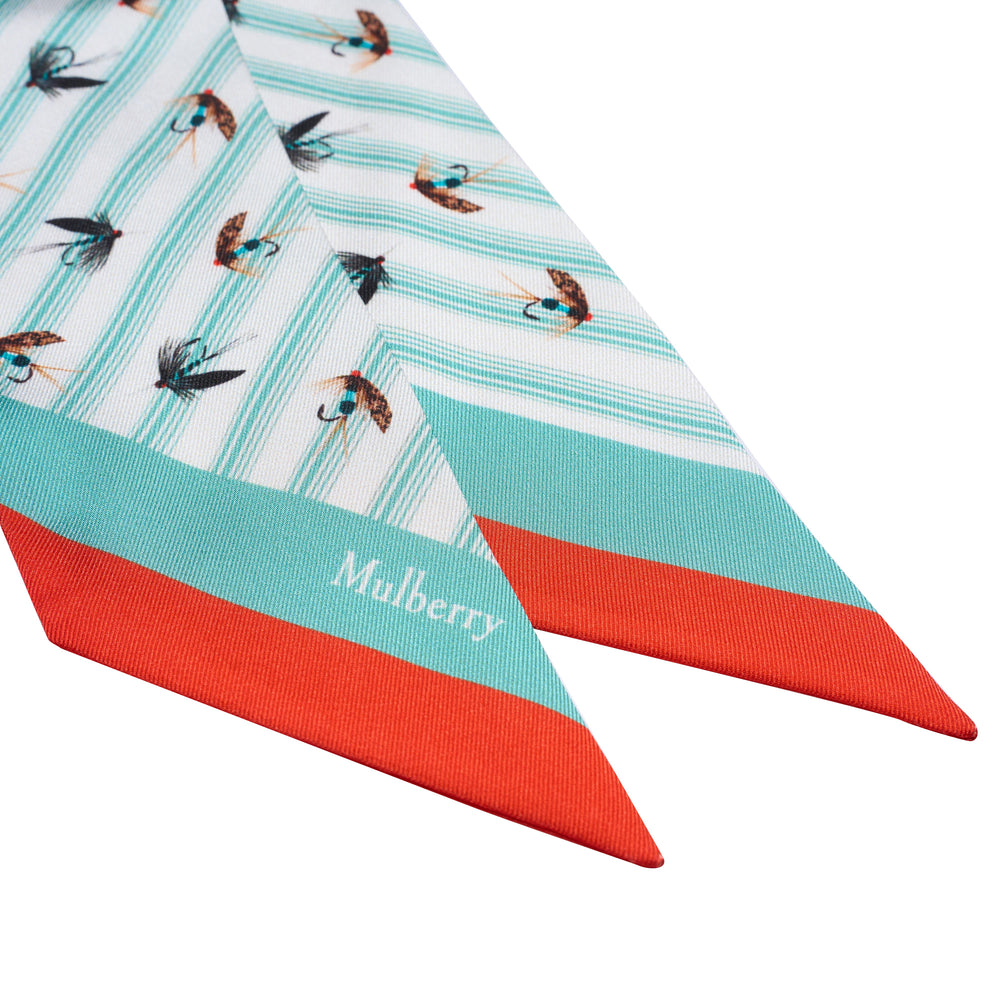 Mulberry Feather Lure Skinny Scarf with diagonal teal stripe ground, allover fly fishing lure print, and coral and teal colour-block pointed ends