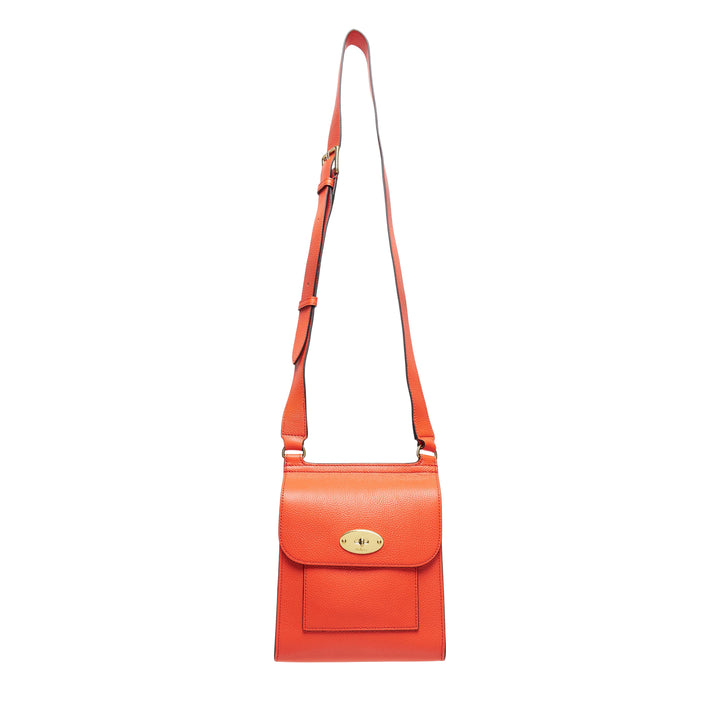 Mulberry Small Antony crossbody bag in orange pebbled leather with gold-tone postman's lock closure and adjustable shoulder strap
