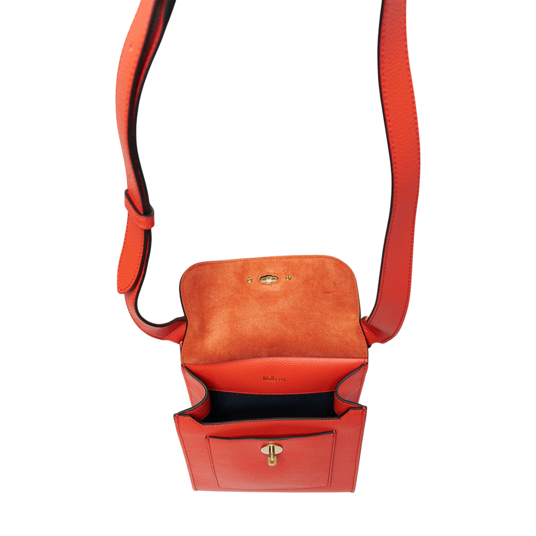 Mulberry Small Antony crossbody bag in orange pebbled leather with gold-tone postman's lock closure and adjustable shoulder strap
