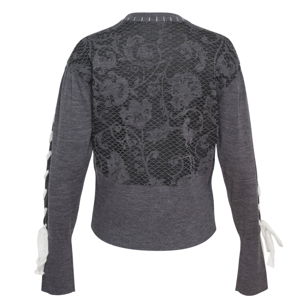 Renli Su grey long sleeve cardigan with black floral lace front panel, lace-up sleeve detailing with white ribbon bows, and snap button closure