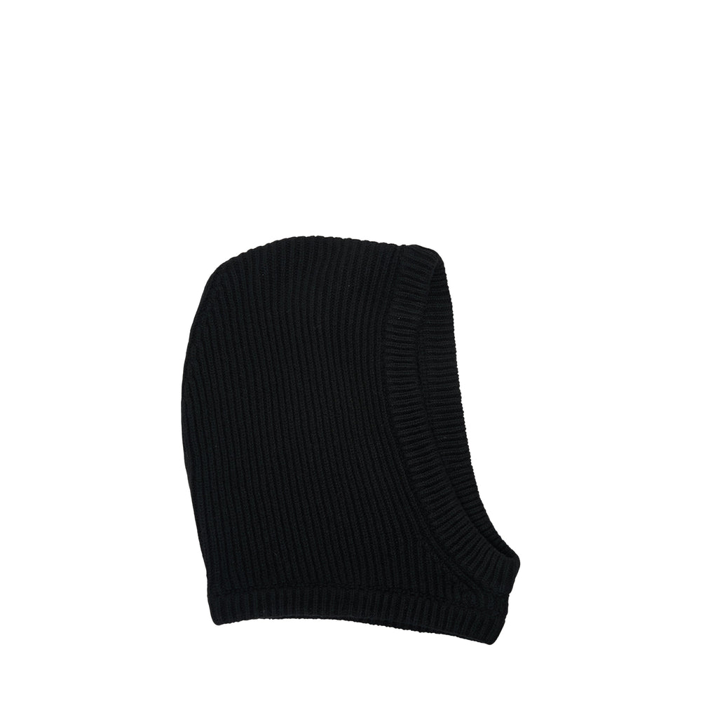 Rick Owens black ribbed knit balaclava hood folded flat, showing sculptural pointed crown and open face aperture