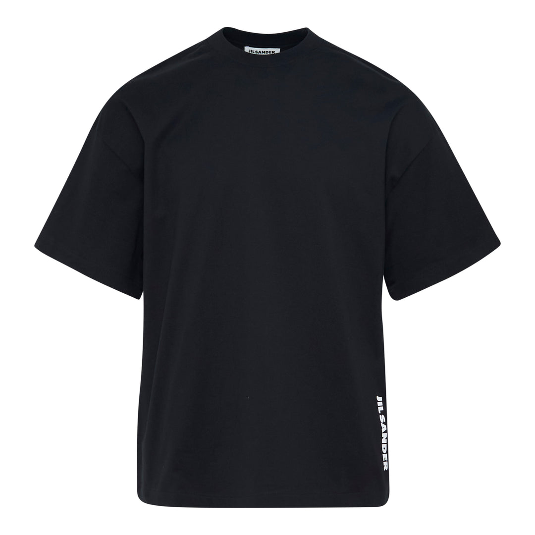 Jil Sander white oversized plain cotton short sleeve tee with vertical logo print at the hem and woven label at the neckline