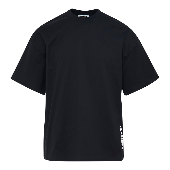 Jil Sander white oversized plain cotton short sleeve tee with vertical logo print at the hem and woven label at the neckline