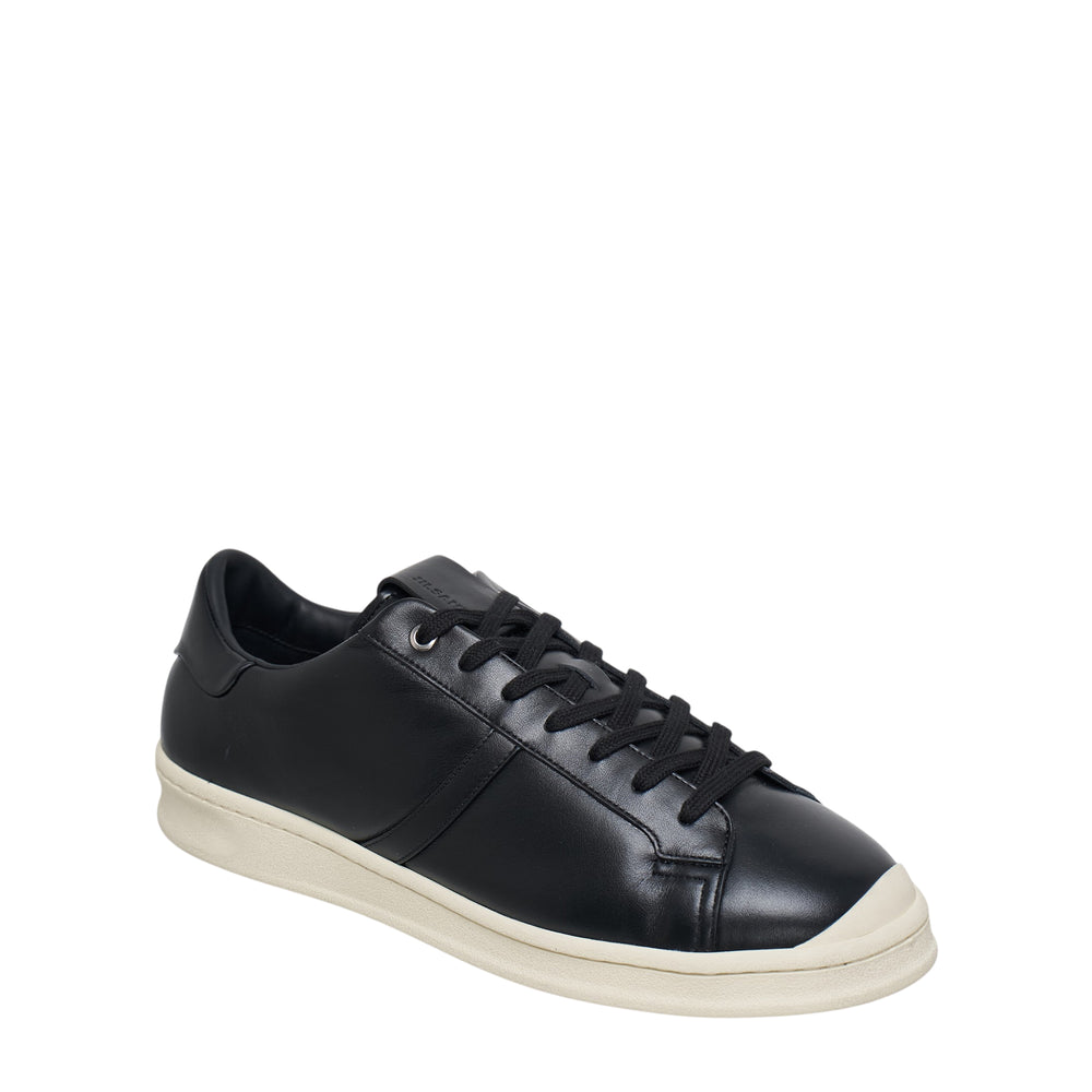 Jil Sander Lux Calf Leather low-top sneaker in black with tonal panelling and off-white cupsole, side profile view