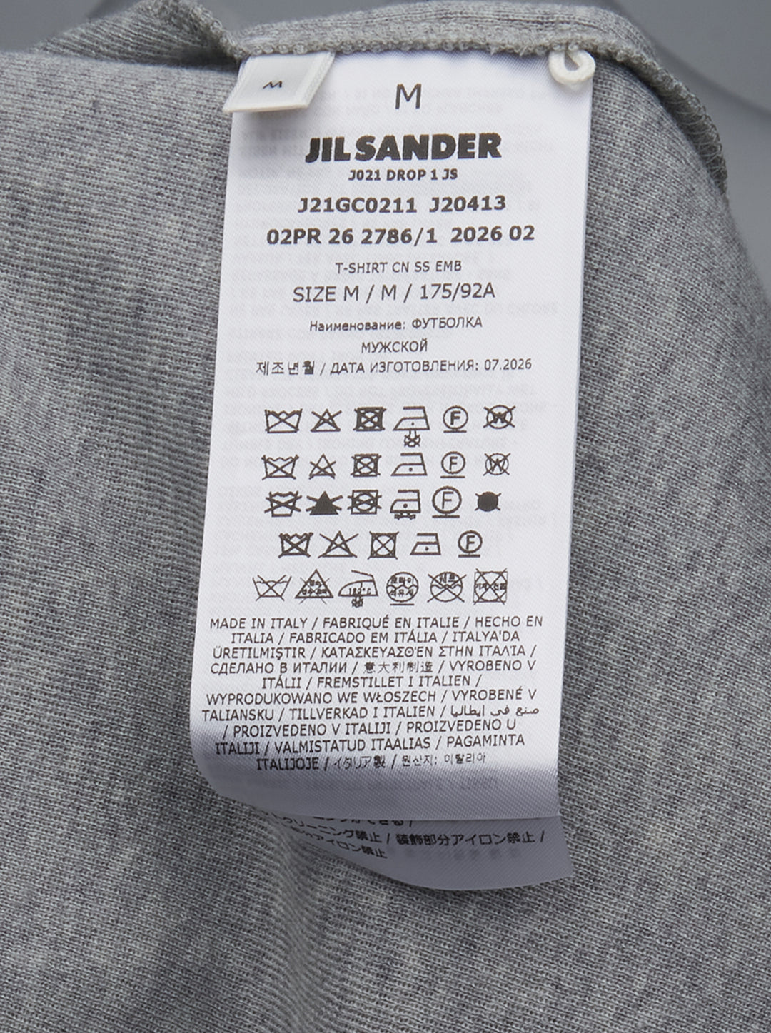 Jil Sander heather grey cotton-cashmere short sleeve crew neck t-shirt with a small navy dot embroidery on the chest and a woven brand label at the back neck - view 3
