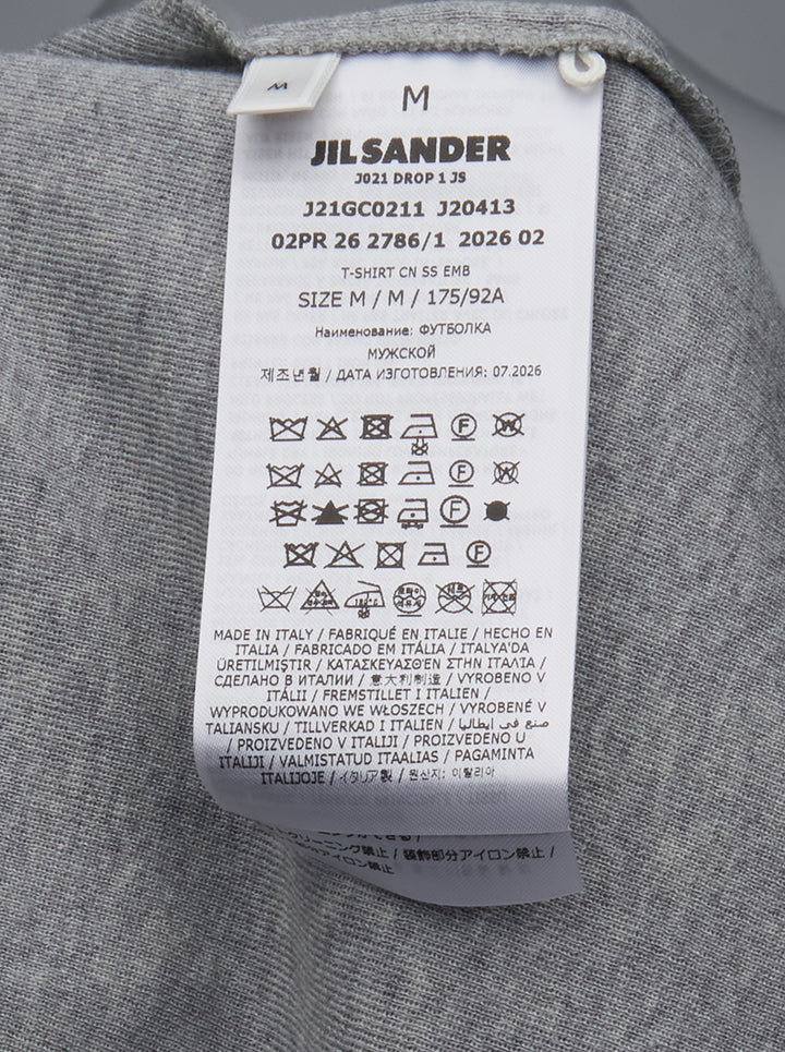 Jil Sander heather grey cotton-cashmere short sleeve crew neck t-shirt with a small navy dot embroidery on the chest and a woven brand label at the back neck - view 3