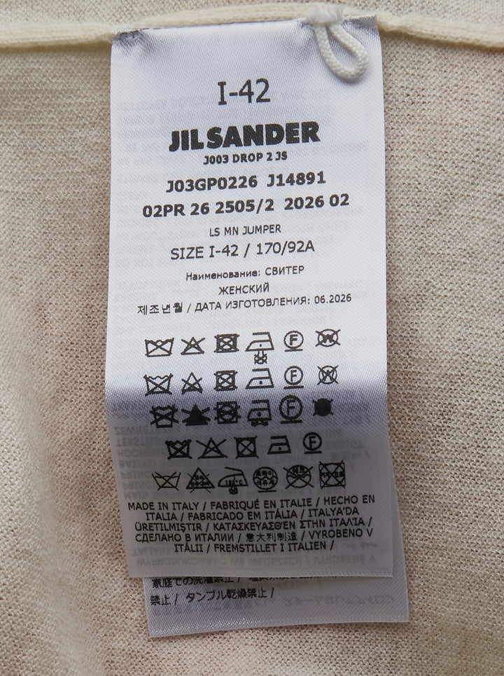 Jil Sander ivory long sleeve mock-neck cashmere jumper with sculptural chevron pleated chest detail, displayed flat on white background - view 3