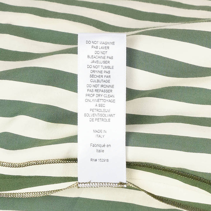 Carolina Herrera Clara Shirt in forest green and ivory vertical stripes, featuring an oversized fit, voluminous bishop sleeves with buttoned cuffs, and a button-front fastening