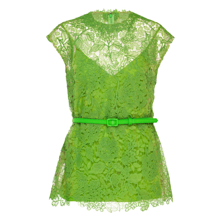 Carolina Herrera bright green floral guipure lace belted crew neck top with cap sleeves, sheer yoke, coordinating slim belt, and scalloped hem, displayed on a white background