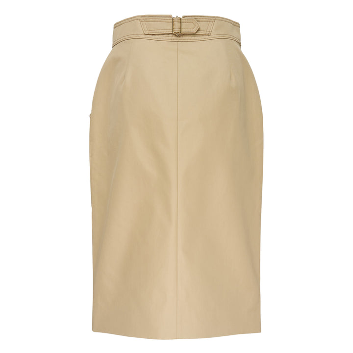 Carolina Herrera camel leather belted pencil skirt with contrast topstitching, hip patch pockets with gold-tone studs, integrated self-fabric belt with gold buckle, and a front centre slit at the hem