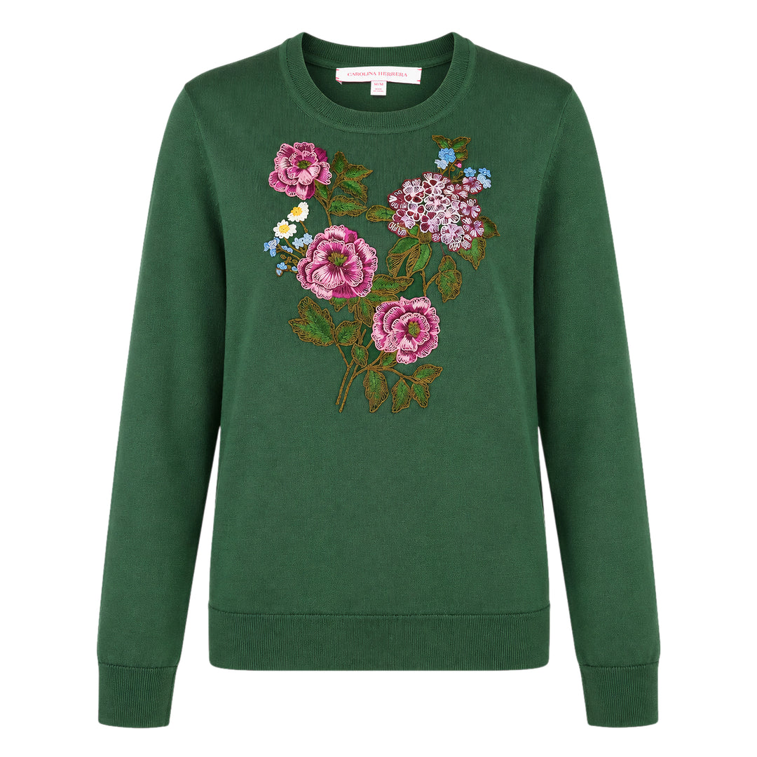 Carolina Herrera forest green long sleeve crew neck sweater with a large multi-floral embroidered bouquet featuring pink roses, hydrangeas, and wildflowers on the chest