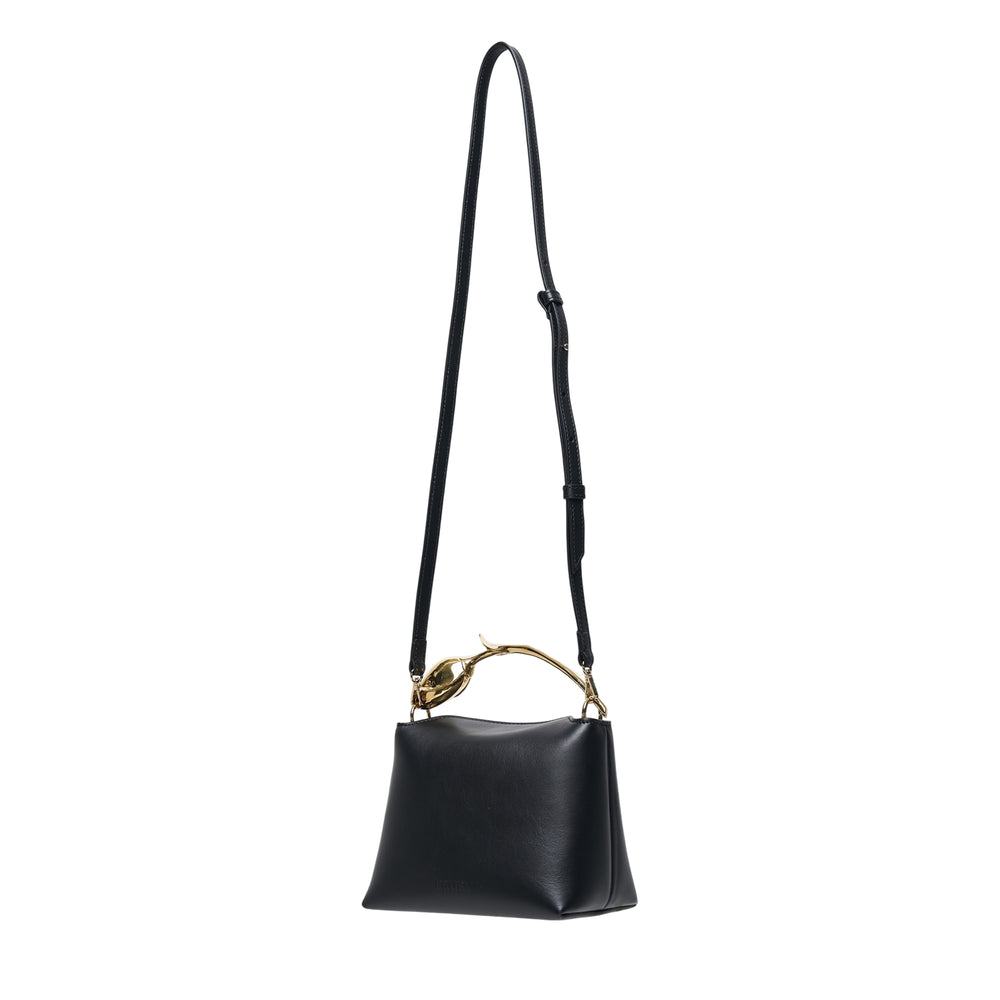 Erdem Mini Bloom Bag in black leather with sculptural gold-tone floral top handle and adjustable crossbody strap, displayed on white background