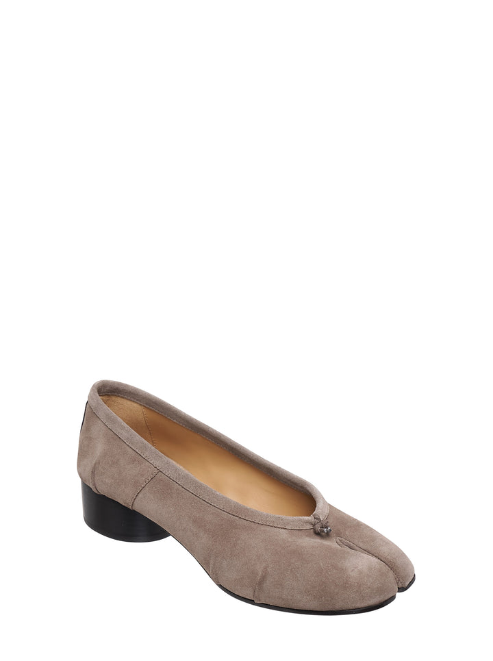 Maison Margiela Tabi ballerina flats in taupe suede with split toe, small bow detail and black cylindrical block heel, shown in side profile - view 2