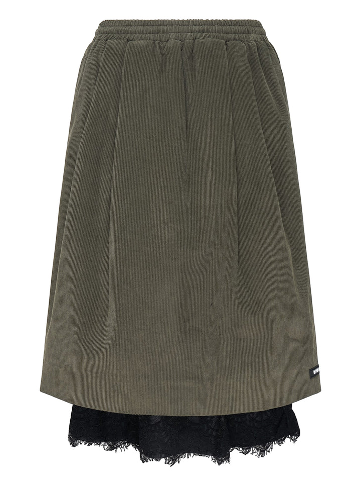 Olive green corduroy midi skirt with an elasticated waist and a black lace underskirt layer peeking out at the hem