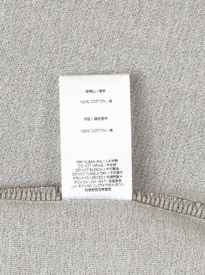 Bonbom olive green heathered oversized t-shirt with a raw-edge trapezoid logo patch at the chest, shown from the front - view 3