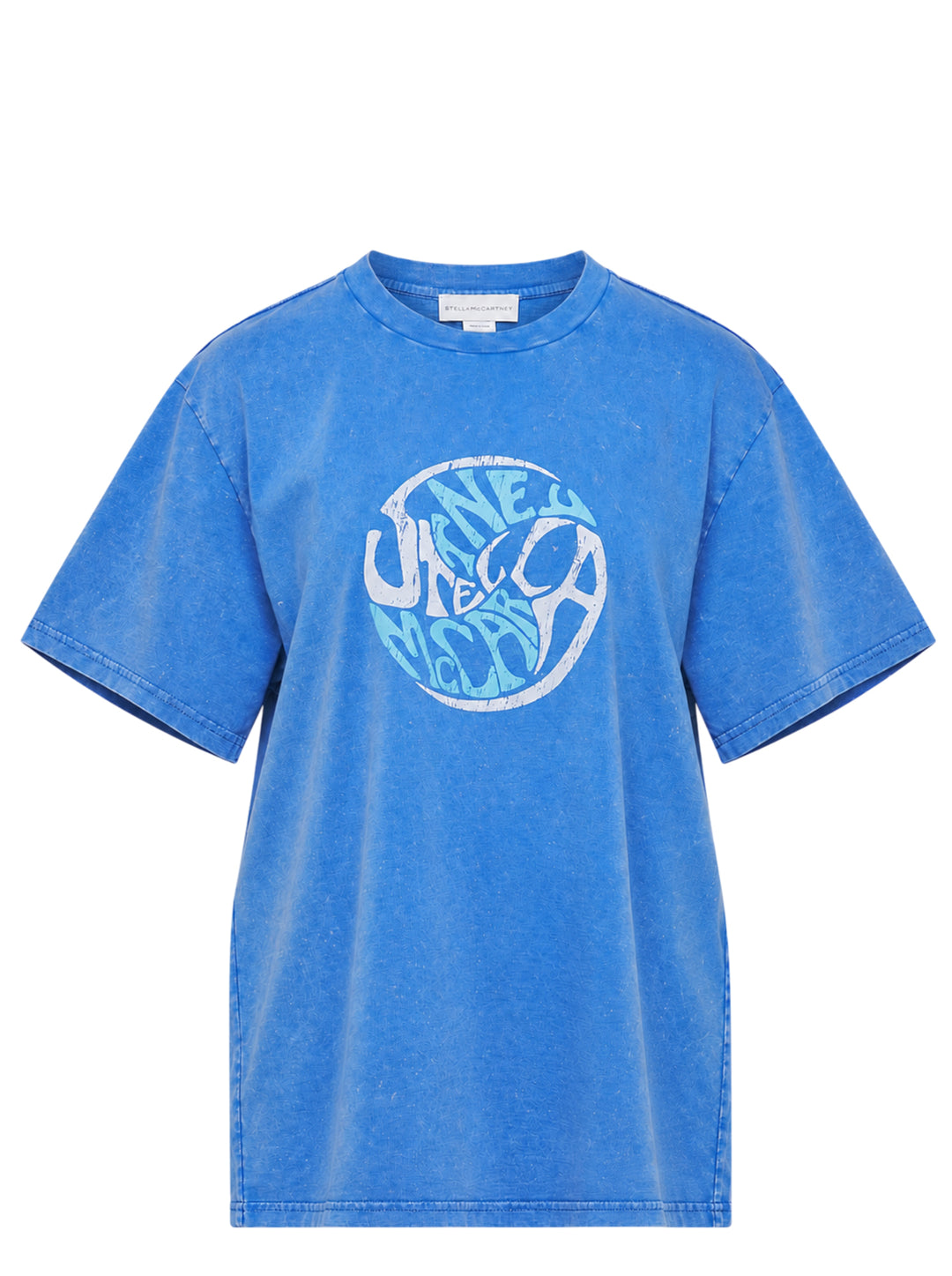 Stella McCartney Abbey Road Boyfriend Tee in acid-washed cobalt blue with a circular psychedelic logo graphic in white and aqua, crew neckline and short sleeves, front view on white background