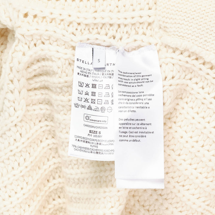 Stella McCartney cream recycled cashmere chunky rib-knit hooded cardigan with tonal button-front closure and relaxed oversized silhouette, displayed flat on a white background