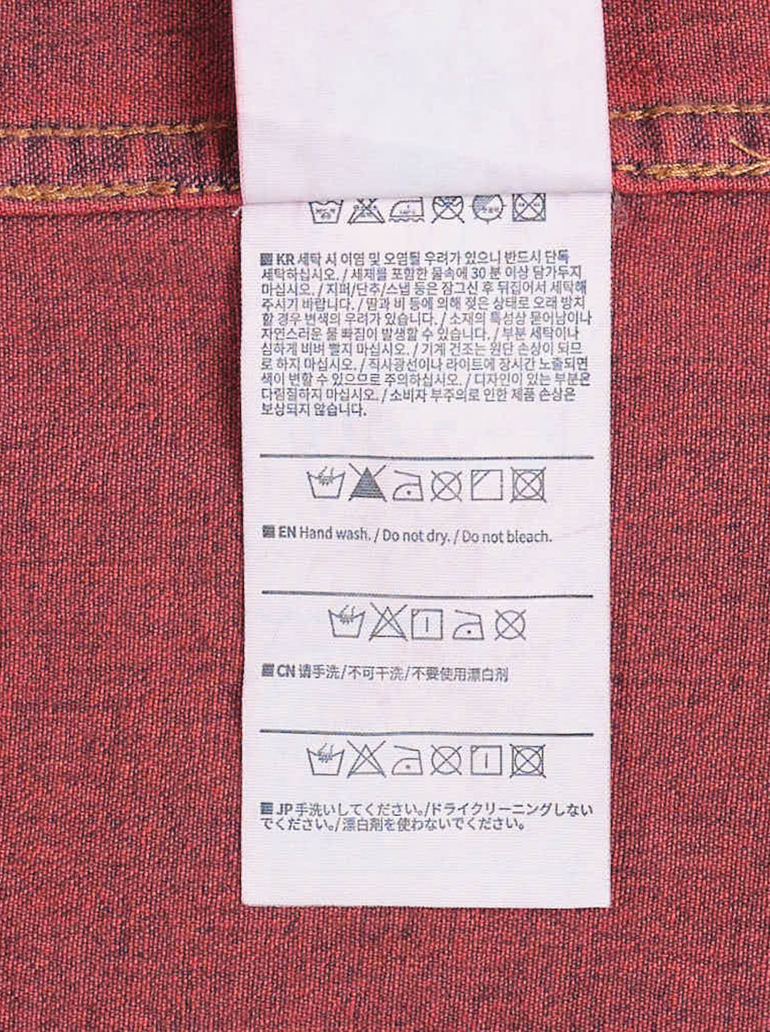 thisisneverthat Washed Denim Long Sleeve Shirt in acid-washed red with button-down collar and embroidered logo on the chest - view 3