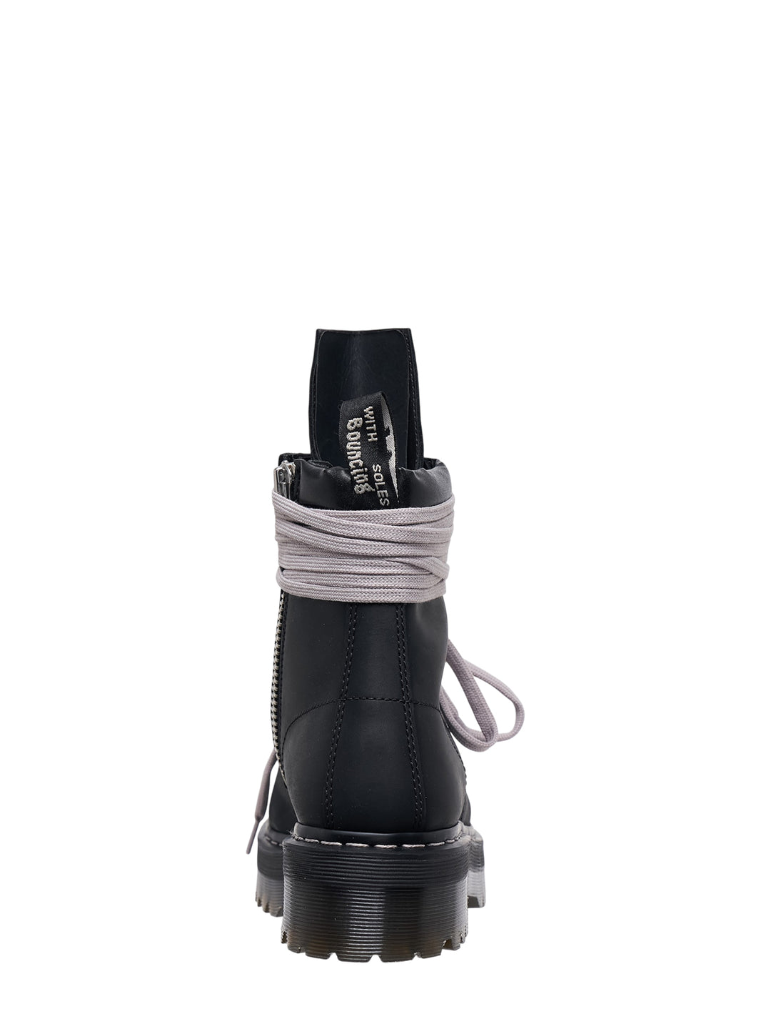 Rick Owens x Dr. Martens Quad Sole Steel Toe Boot in black leather with oversized pale lavender laces wrapped around the ankle and chunky ridged platform sole - view 3