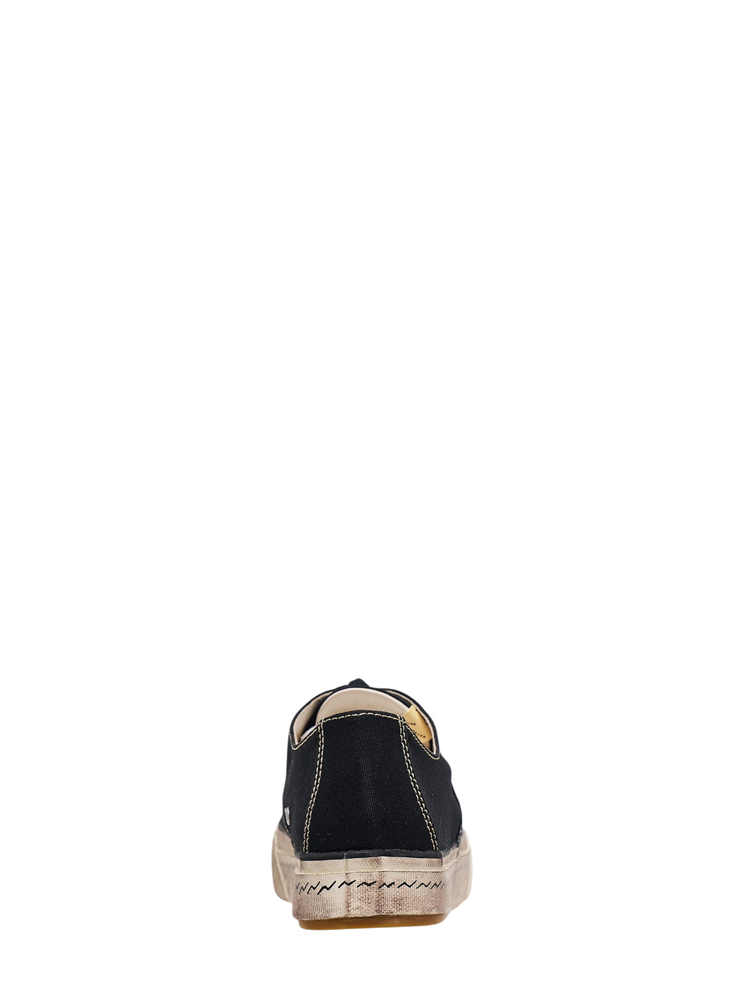 visvim Logan Deck Lo black canvas sneaker with contrast stitching and distressed off-white sole, side view - view 3