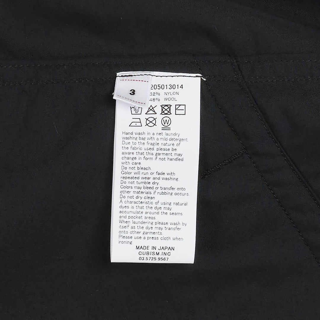 visvim Windfall Coach Jacket in black with embroidered Harmony script, snap-button front closure, and elasticated cuffs - view 4