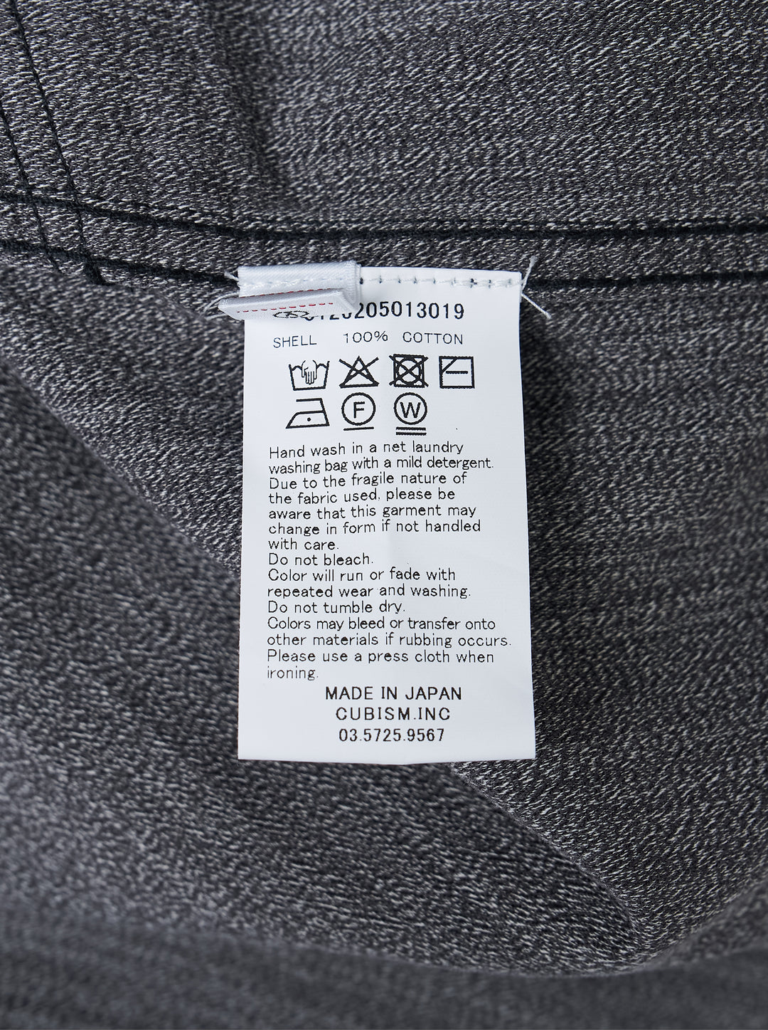 visvim Eclair Coverall Custom Long jacket in washed charcoal grey with paint splatter details, zip chest pocket and angled zip waist pockets - view 3
