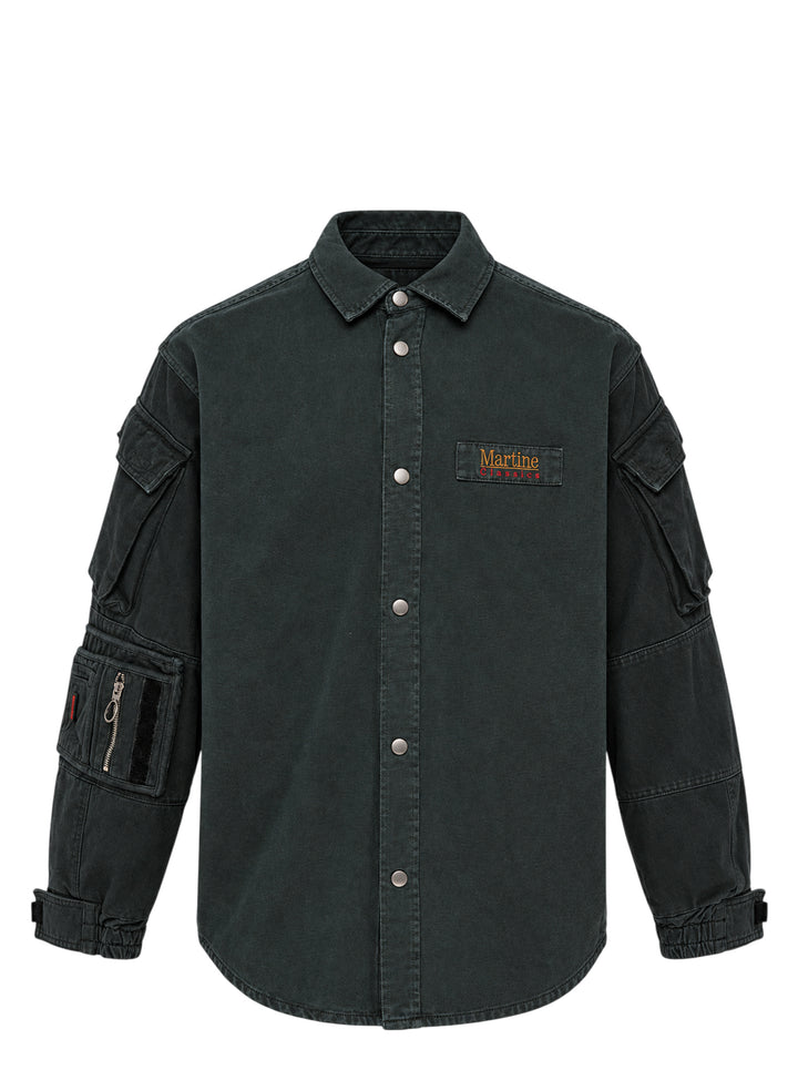 Martine Rose utility sleeve shirt in washed charcoal with snap-button front, flap sleeve pockets and woven Martine Classics chest label