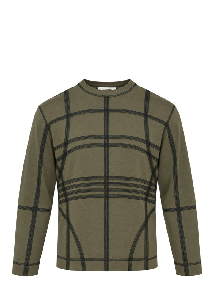 Craig Green olive long sleeve T-shirt with black flatlock stitching forming a grid pattern across the body and sleeves
