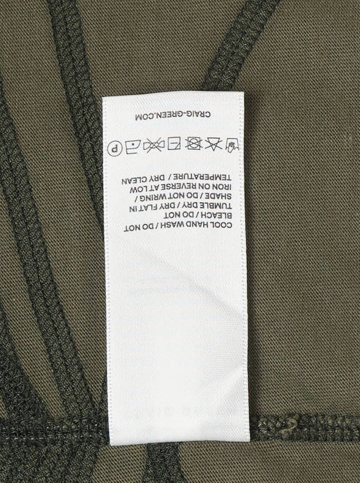 Craig Green olive long sleeve T-shirt with black flatlock stitching forming a grid pattern across the body and sleeves - view 3